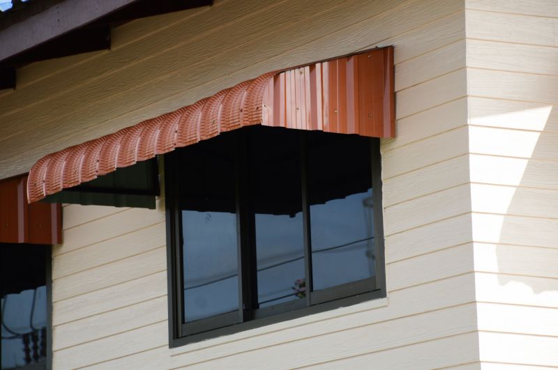 Awning Windows Above a Basement Door